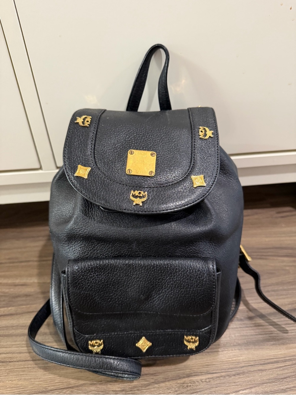 Authen Vintage MCM Black Pebbled Leather Backpack with Gold Accents